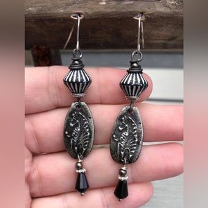 Artisan handmade pewter zebra earrings by Lynn Ferro.